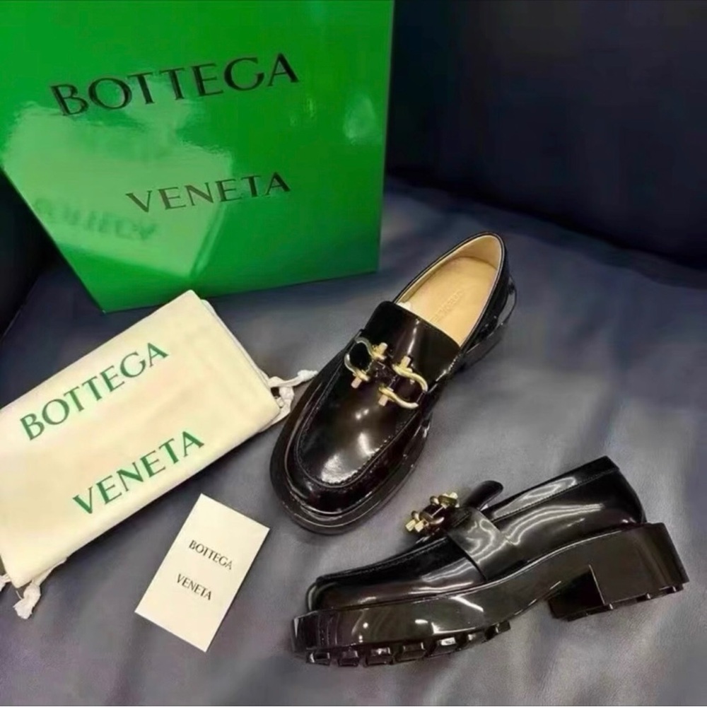 Bottega Veneta Shiny Black Loafers with Gold Accents
